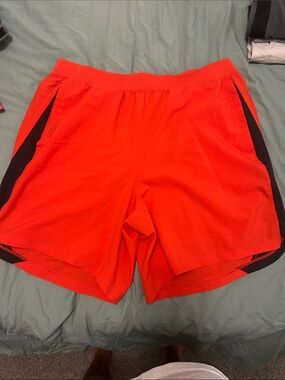 Under Armour Men's Neon Orange Athletic Shorts with Black Panels